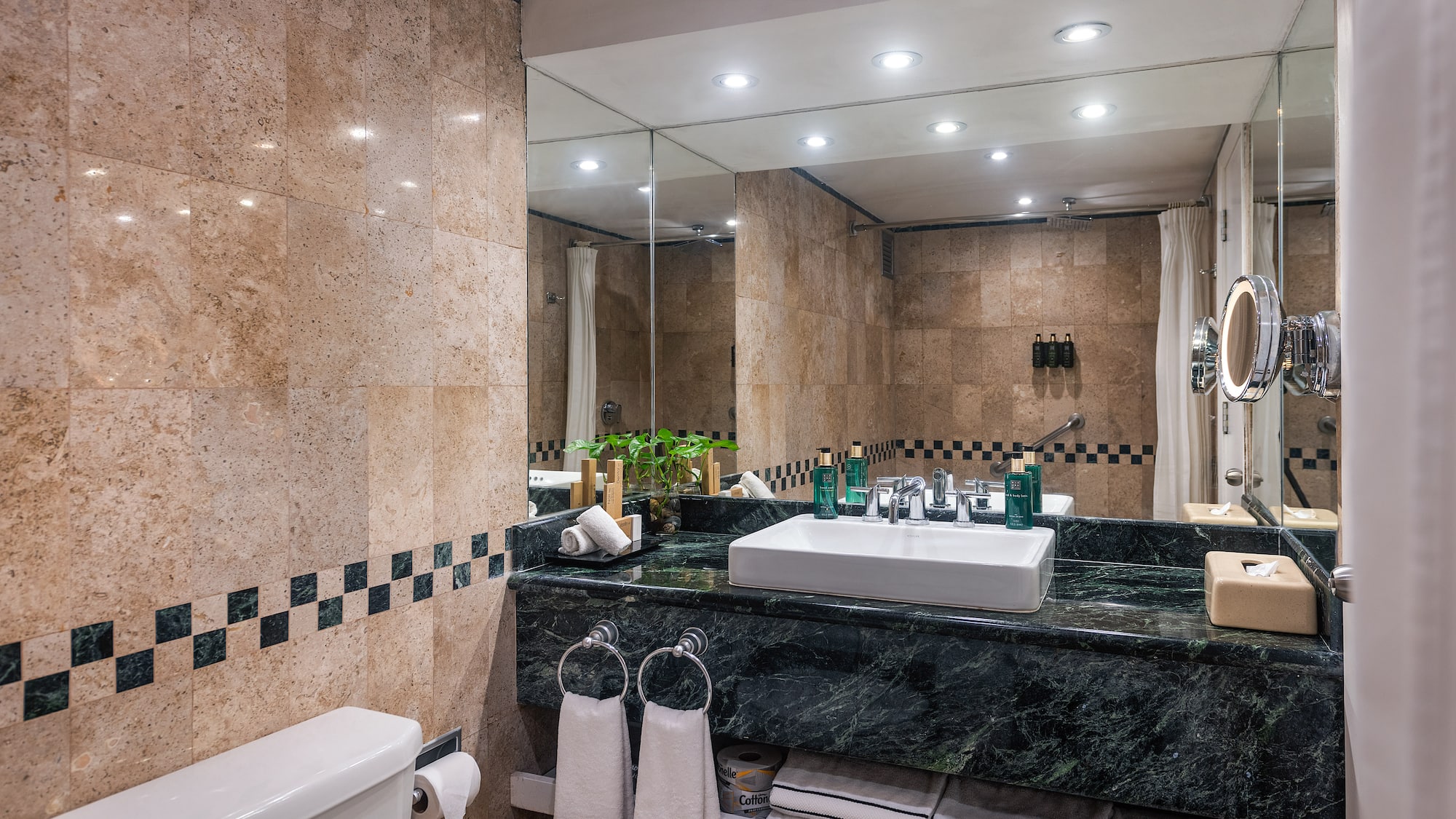 a bathroom with a sink and mirror