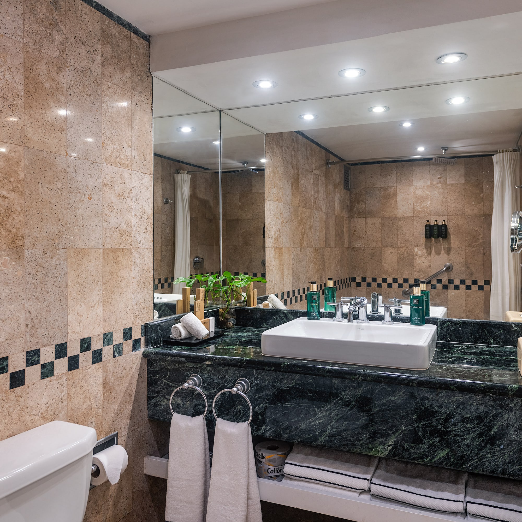 a bathroom with a sink and mirror