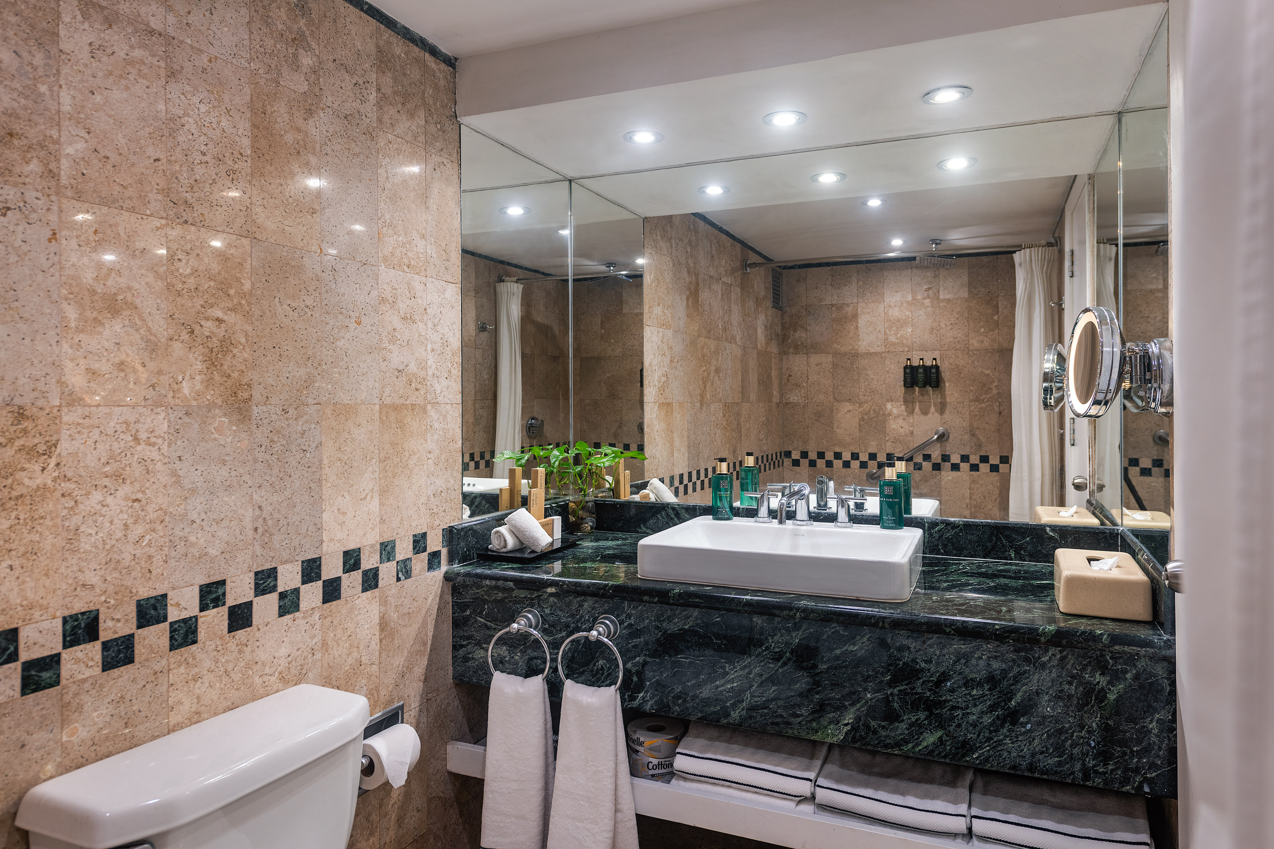 a bathroom with a sink and mirror