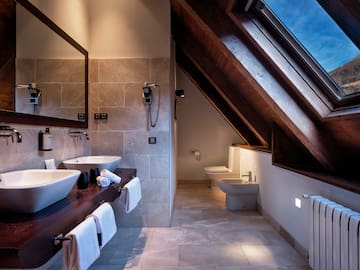 a bathroom with a large window