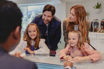 a group of people around a table