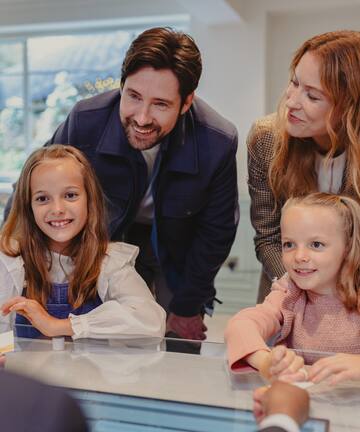 a group of people around a table