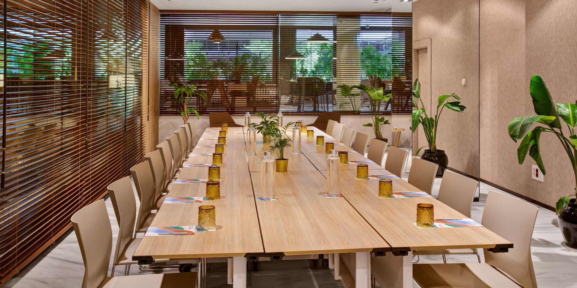 a long table with glasses on it