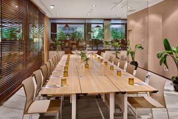 a long table with glasses on it