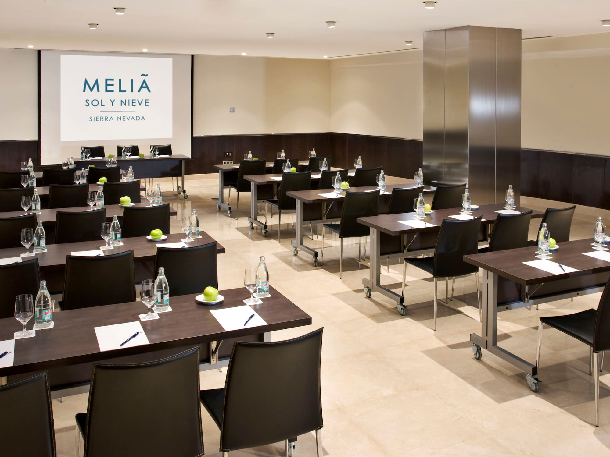 a room with tables and chairs