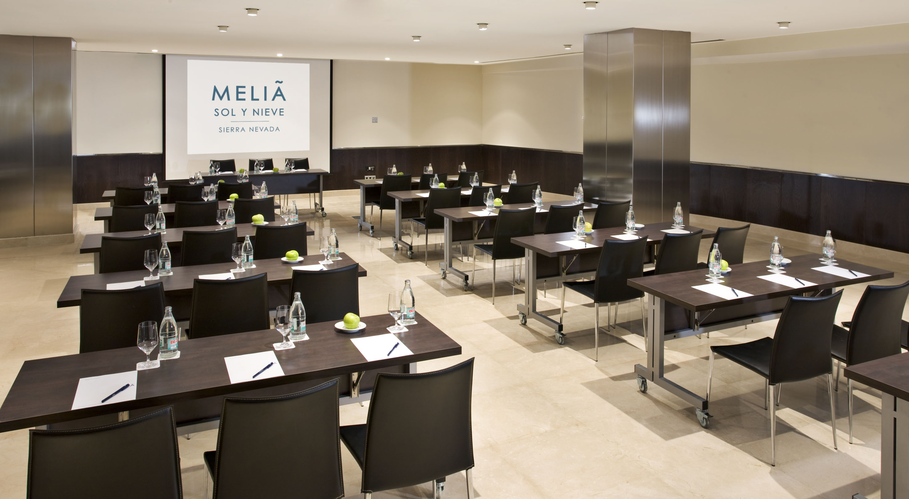 a room with tables and chairs