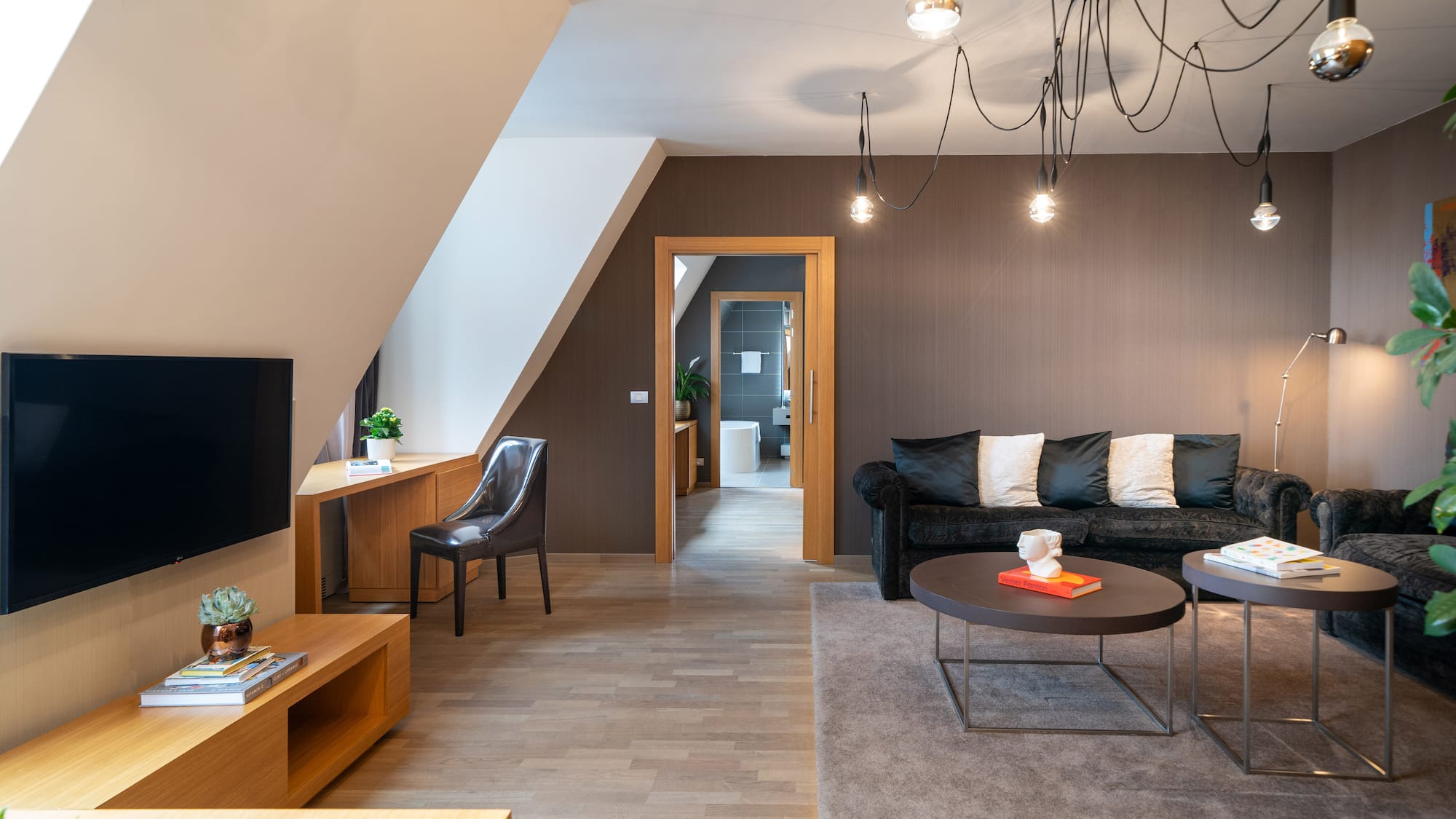 a living room with a couch and a tv