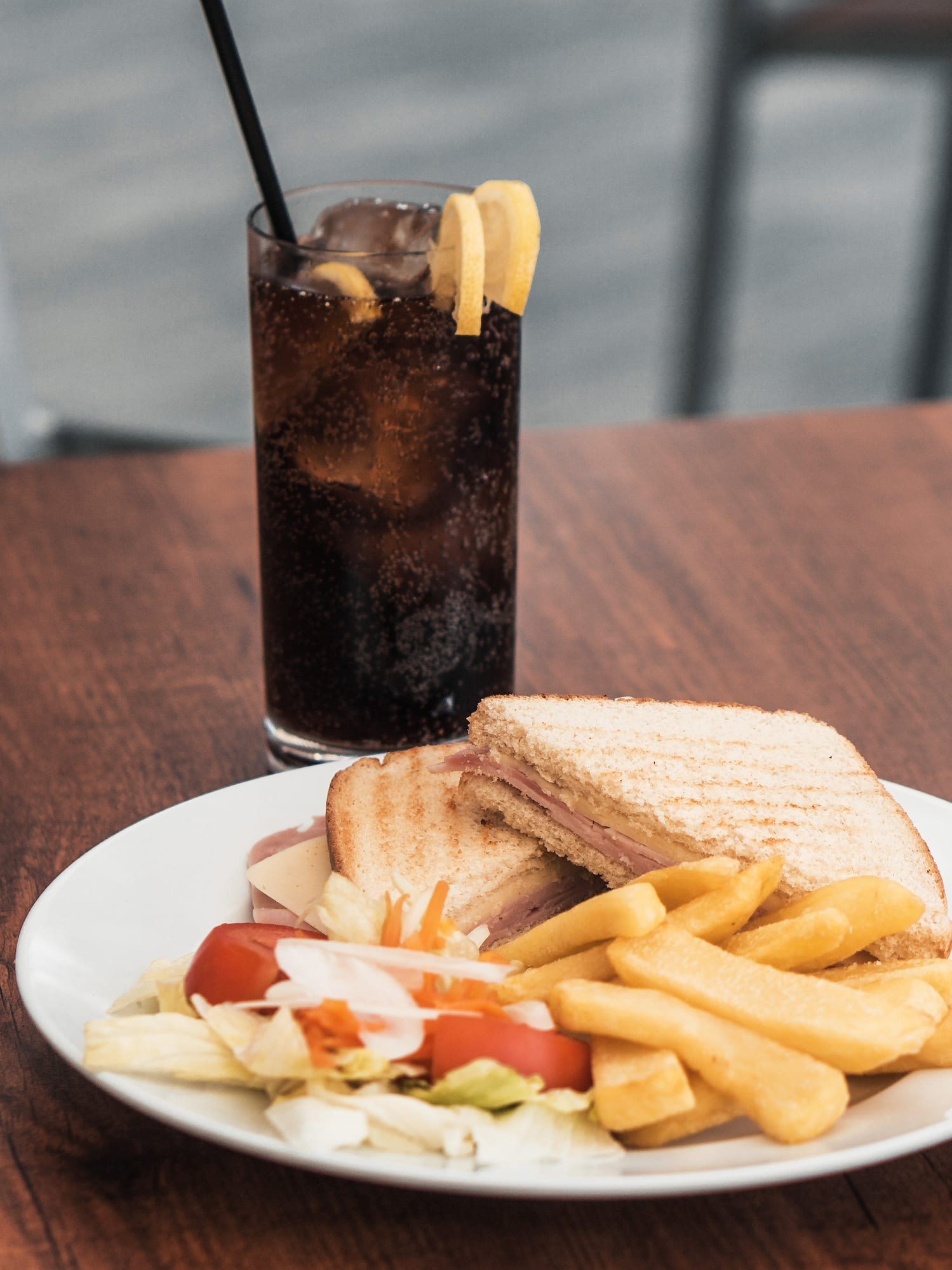 a plate of food and a drink on a table