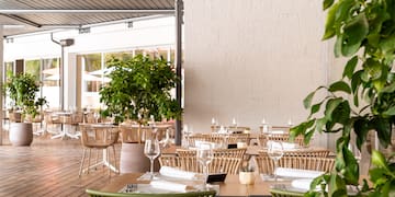 a tables set up for a restaurant
