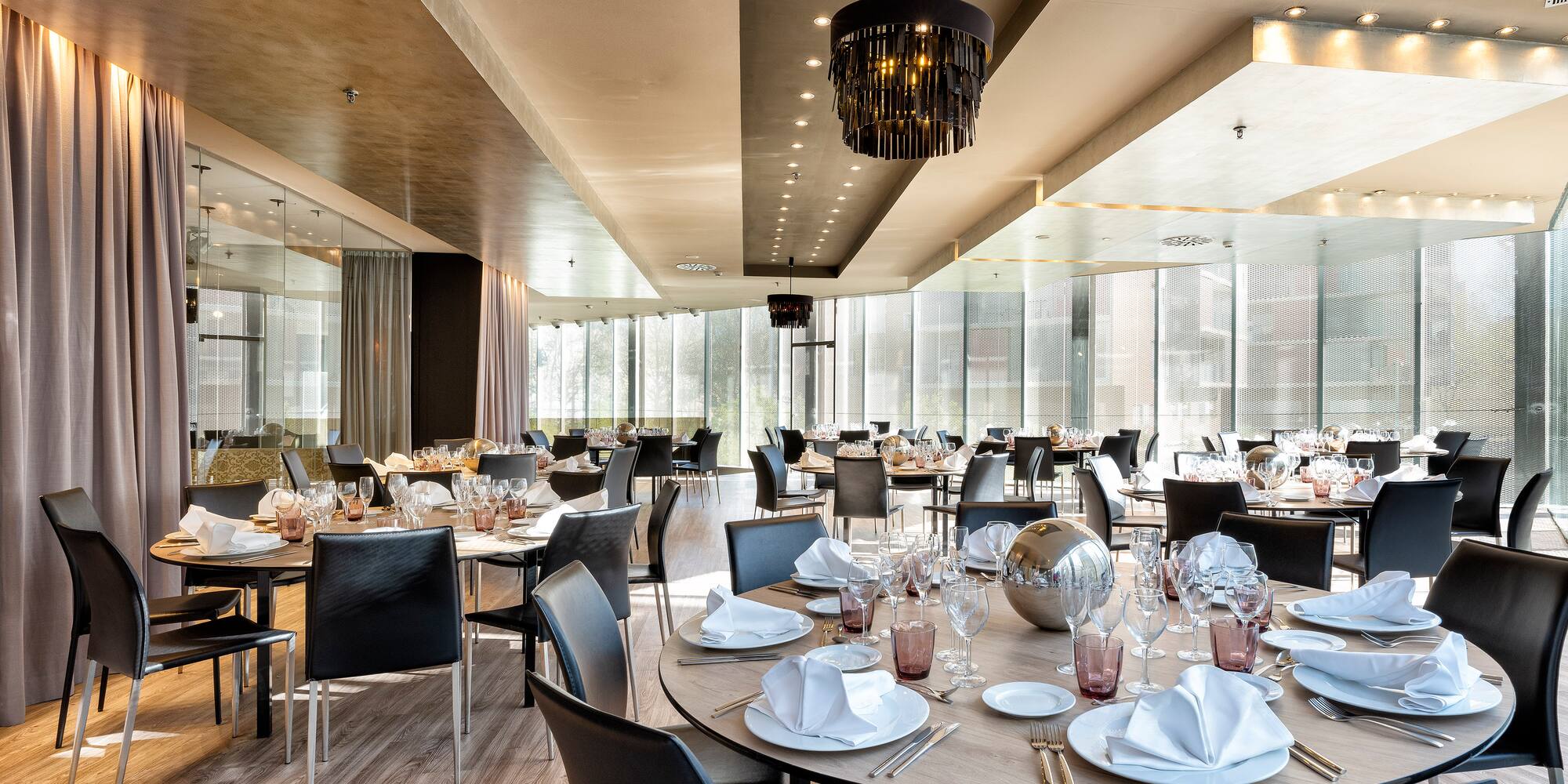 a room with tables and chairs