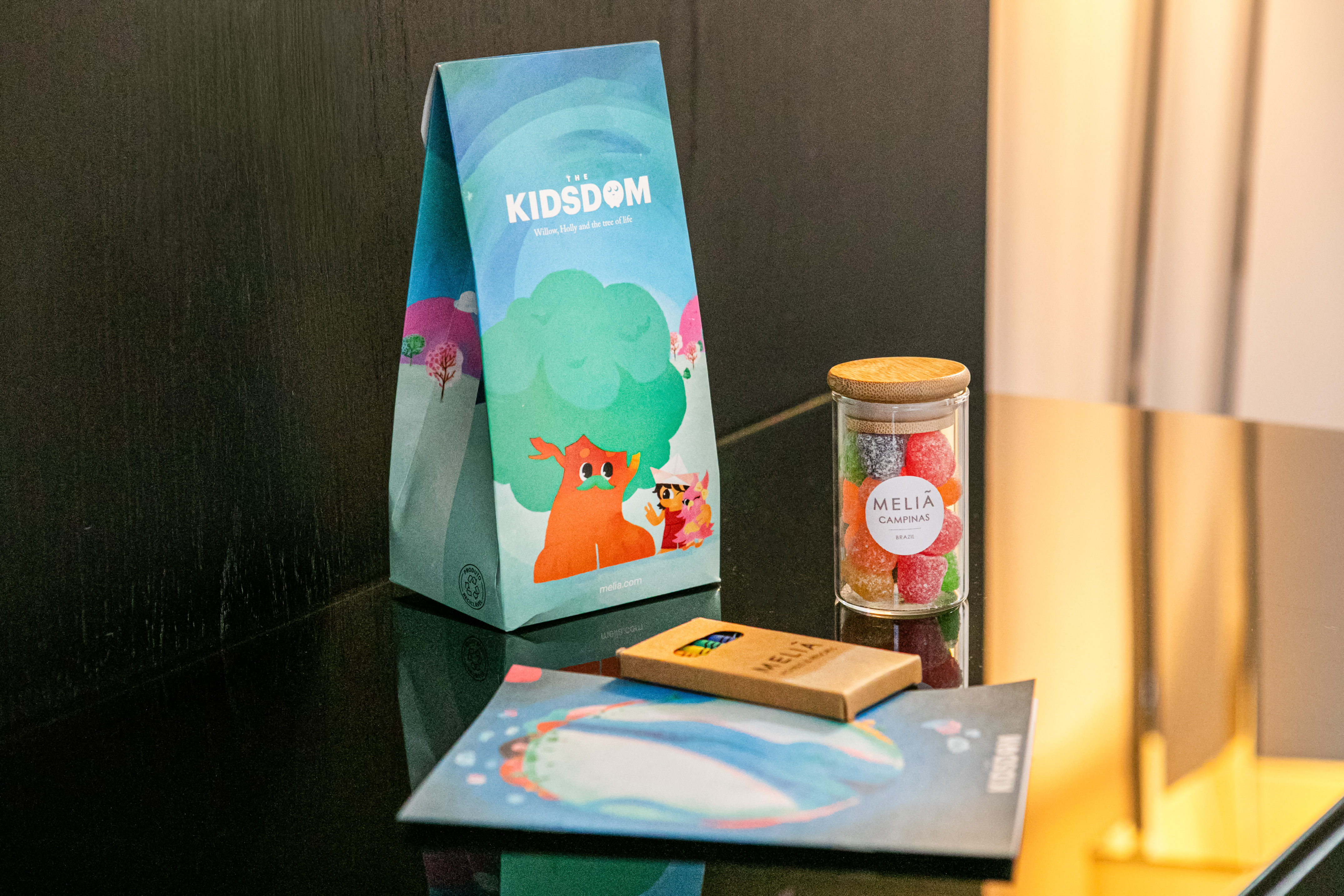 Meliá Campinas Kidsdom welcome kit with colorful candies.