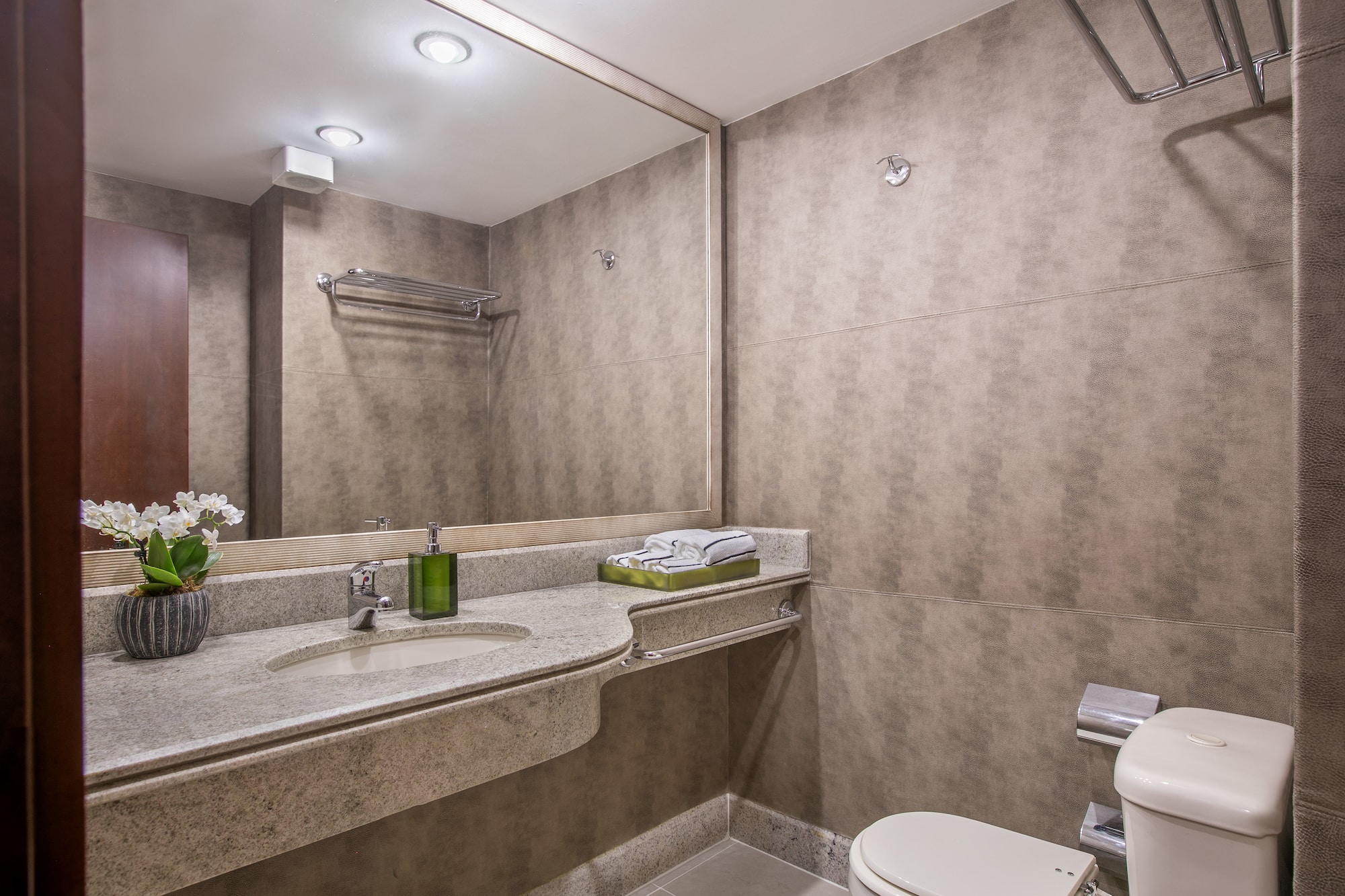 a bathroom with a sink and toilet