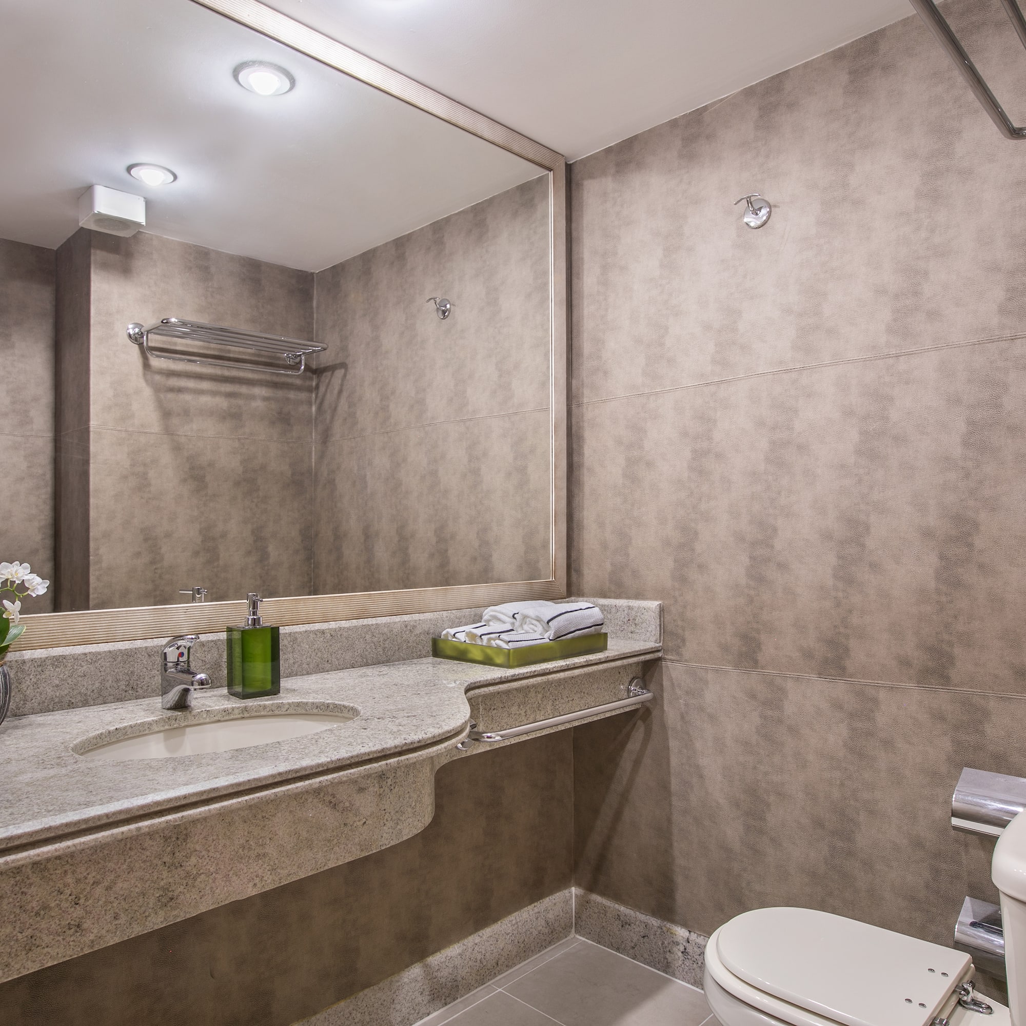 a bathroom with a sink and toilet