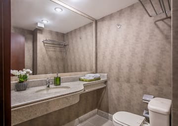 a bathroom with a sink and toilet