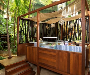 a wooden structure with a glass top