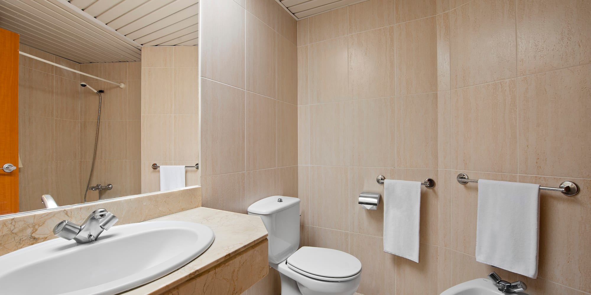 a bathroom with a sink and toilet