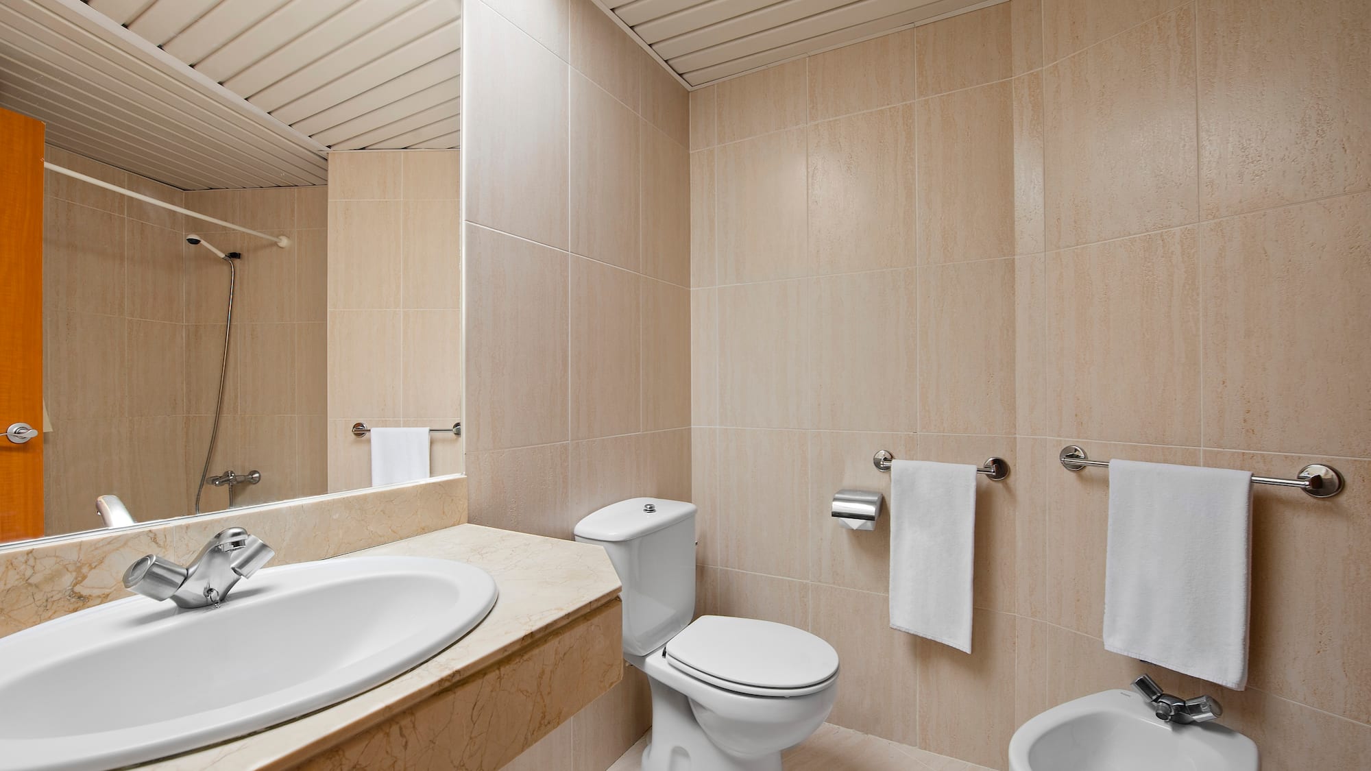 a bathroom with a sink and toilet