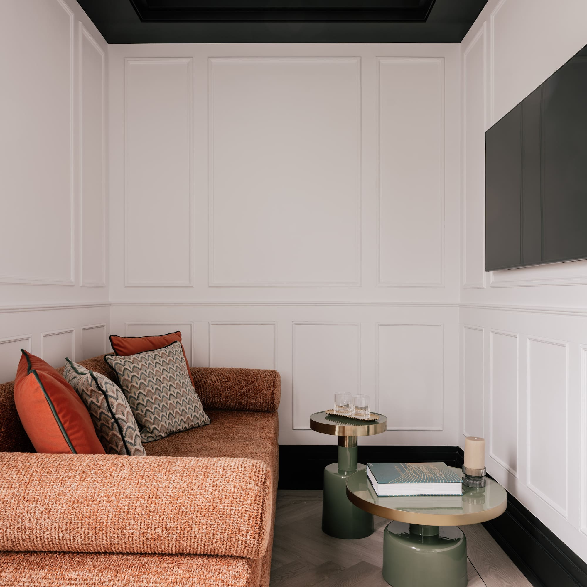 a bedroom with a bed and a bed bench