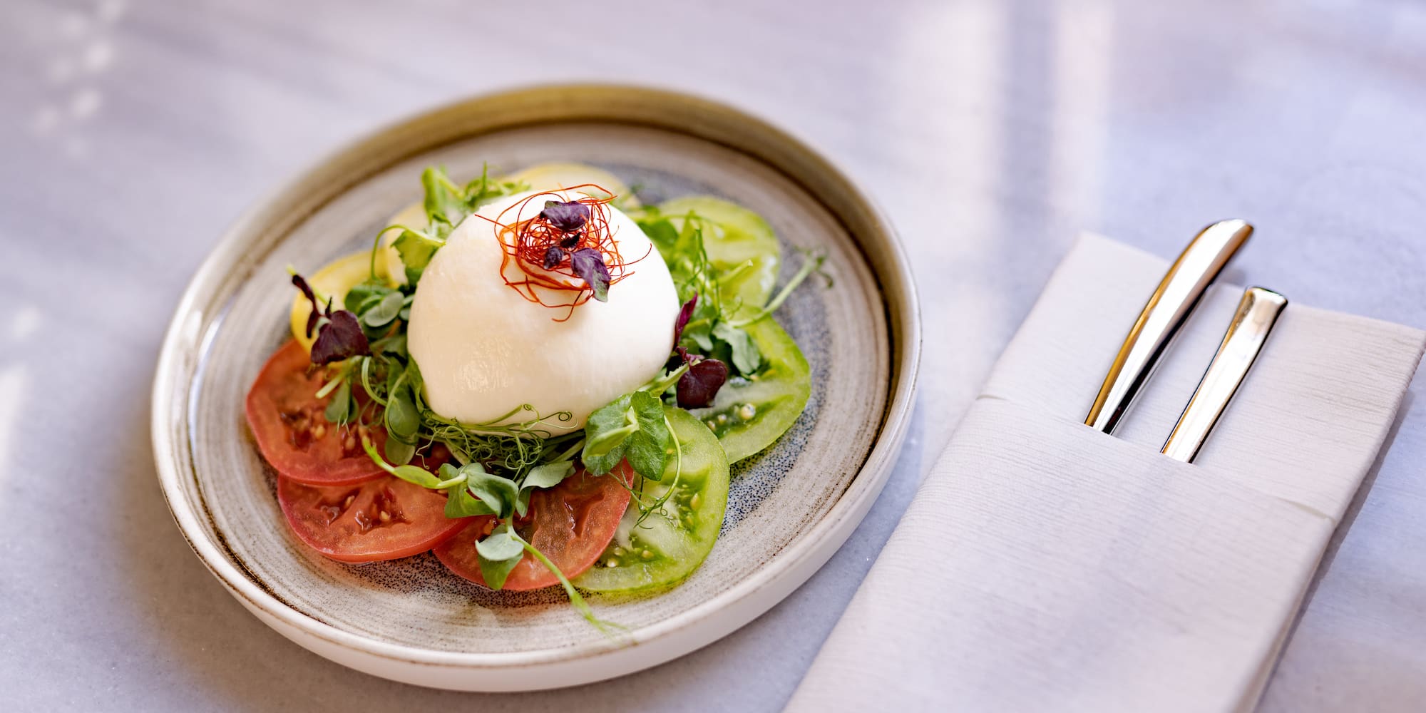 a plate of food with a fork and knife