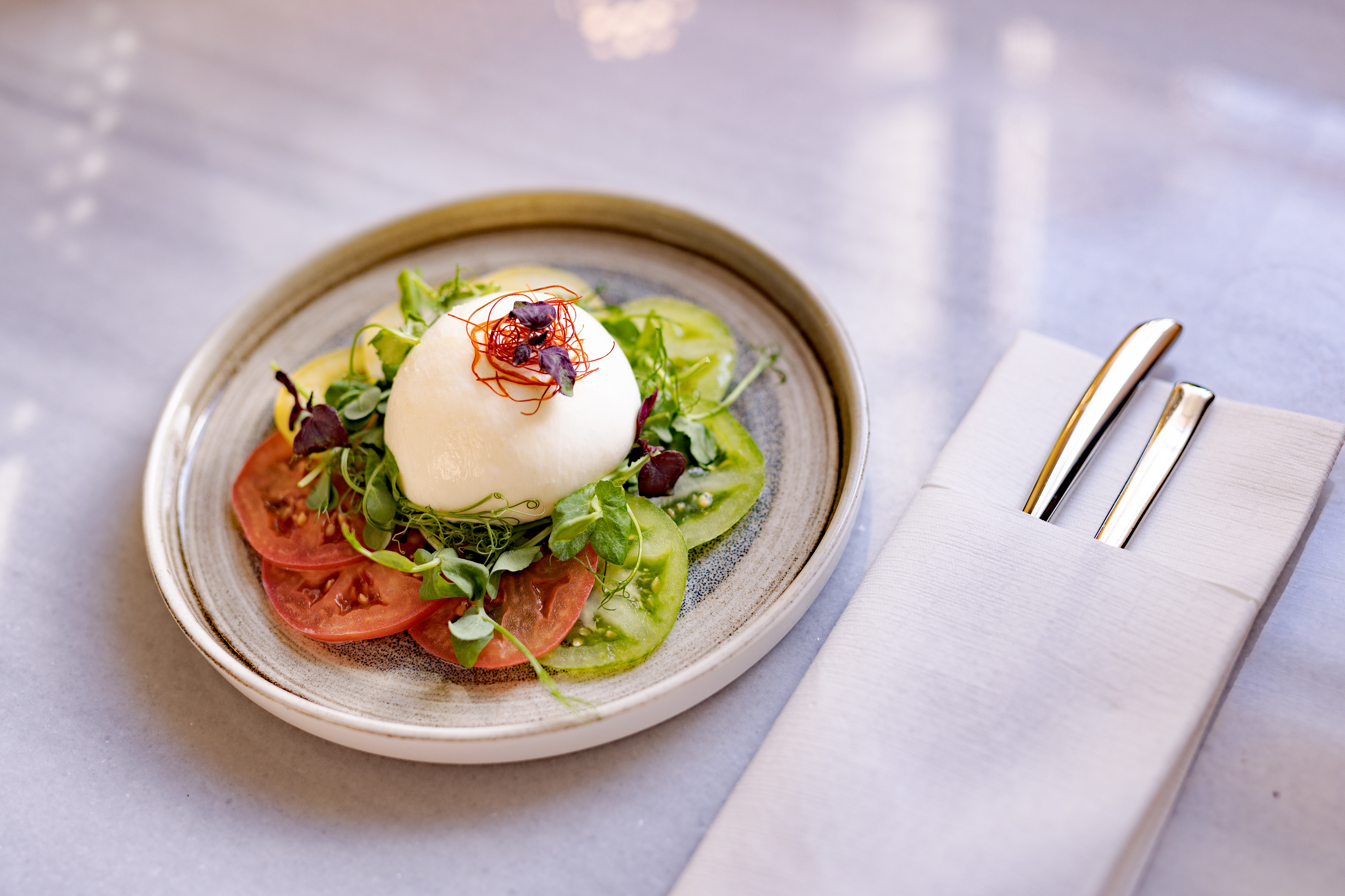 a plate of food with a fork and knife