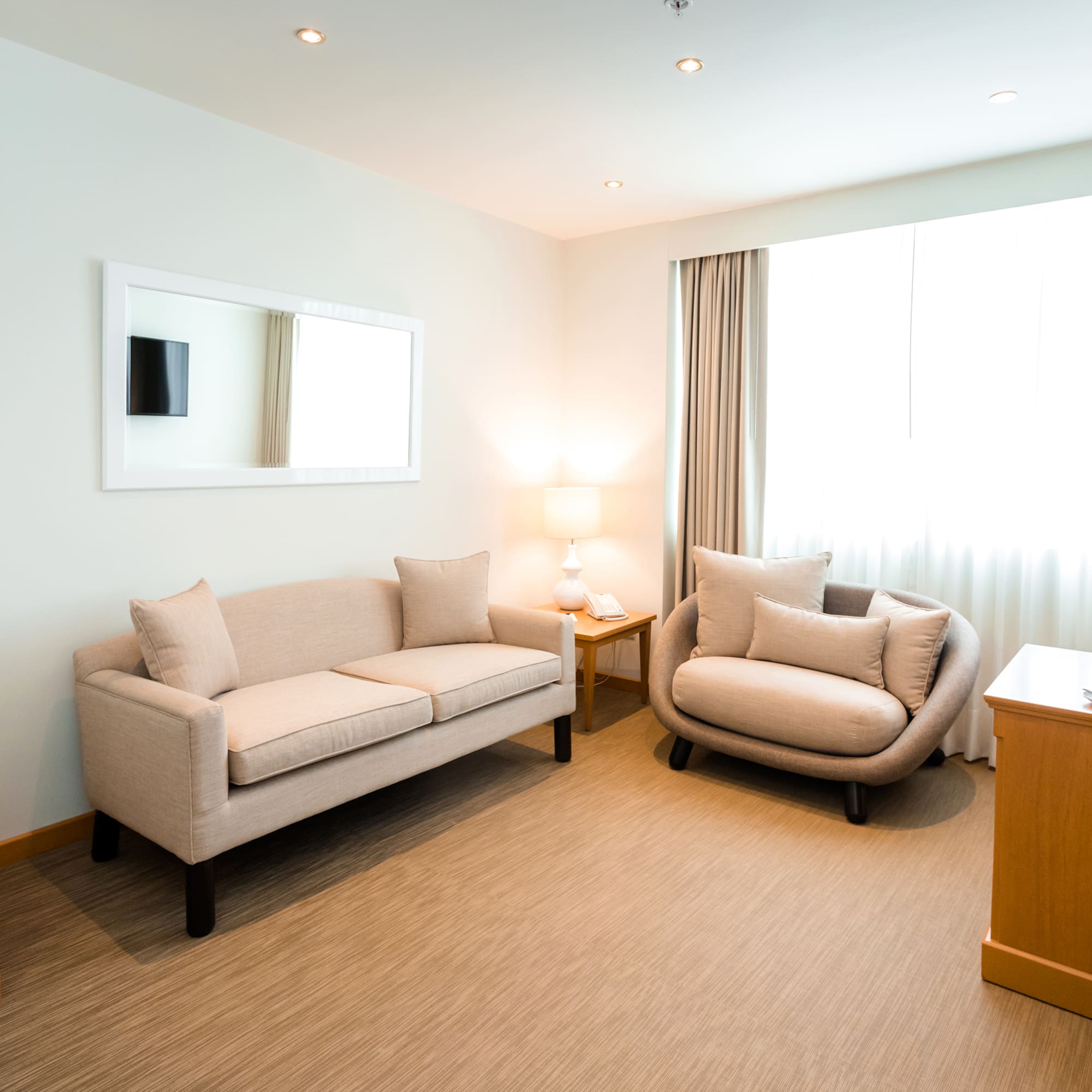 a room with a couch and a chair