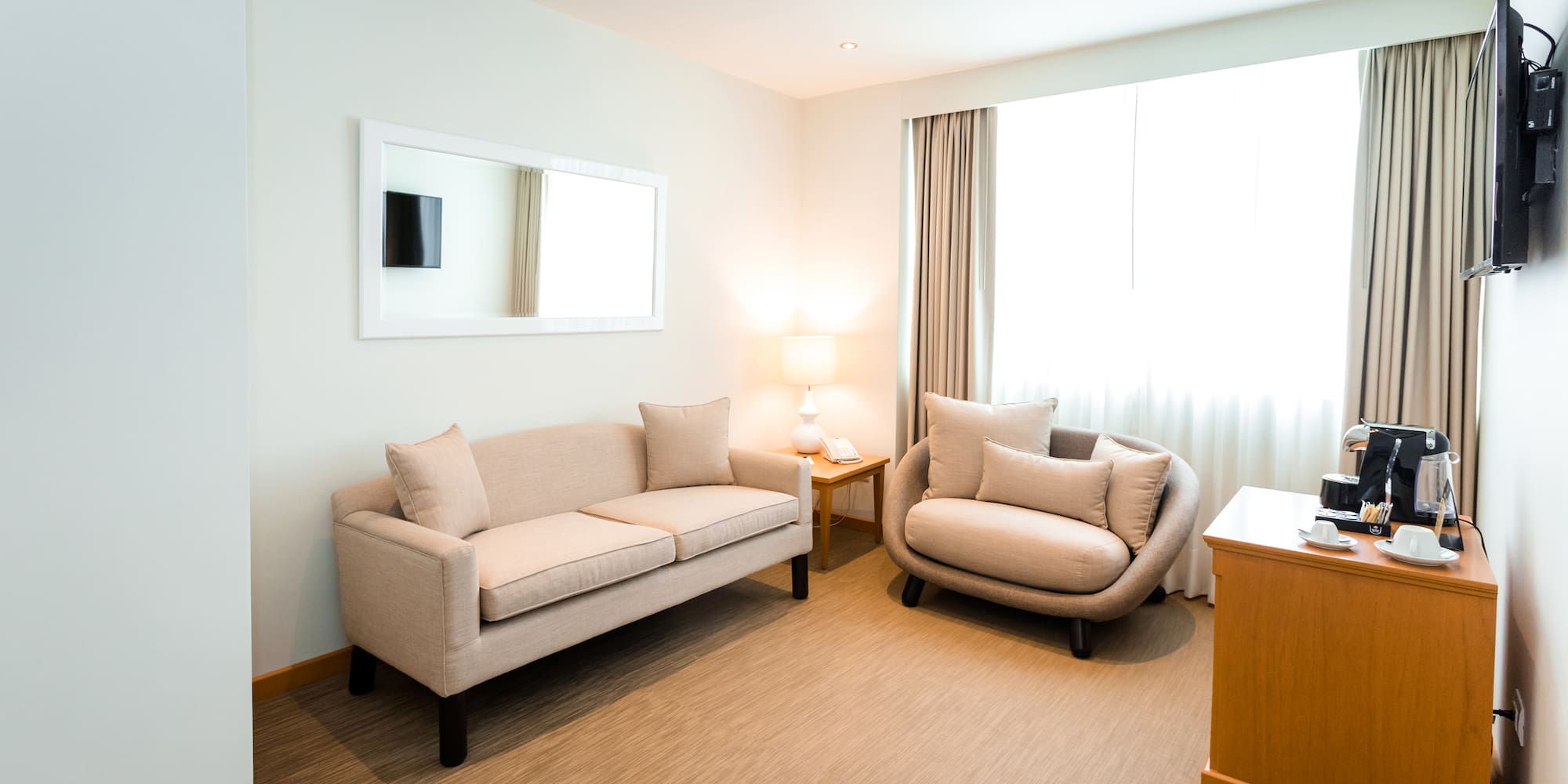 a room with a couch and a chair