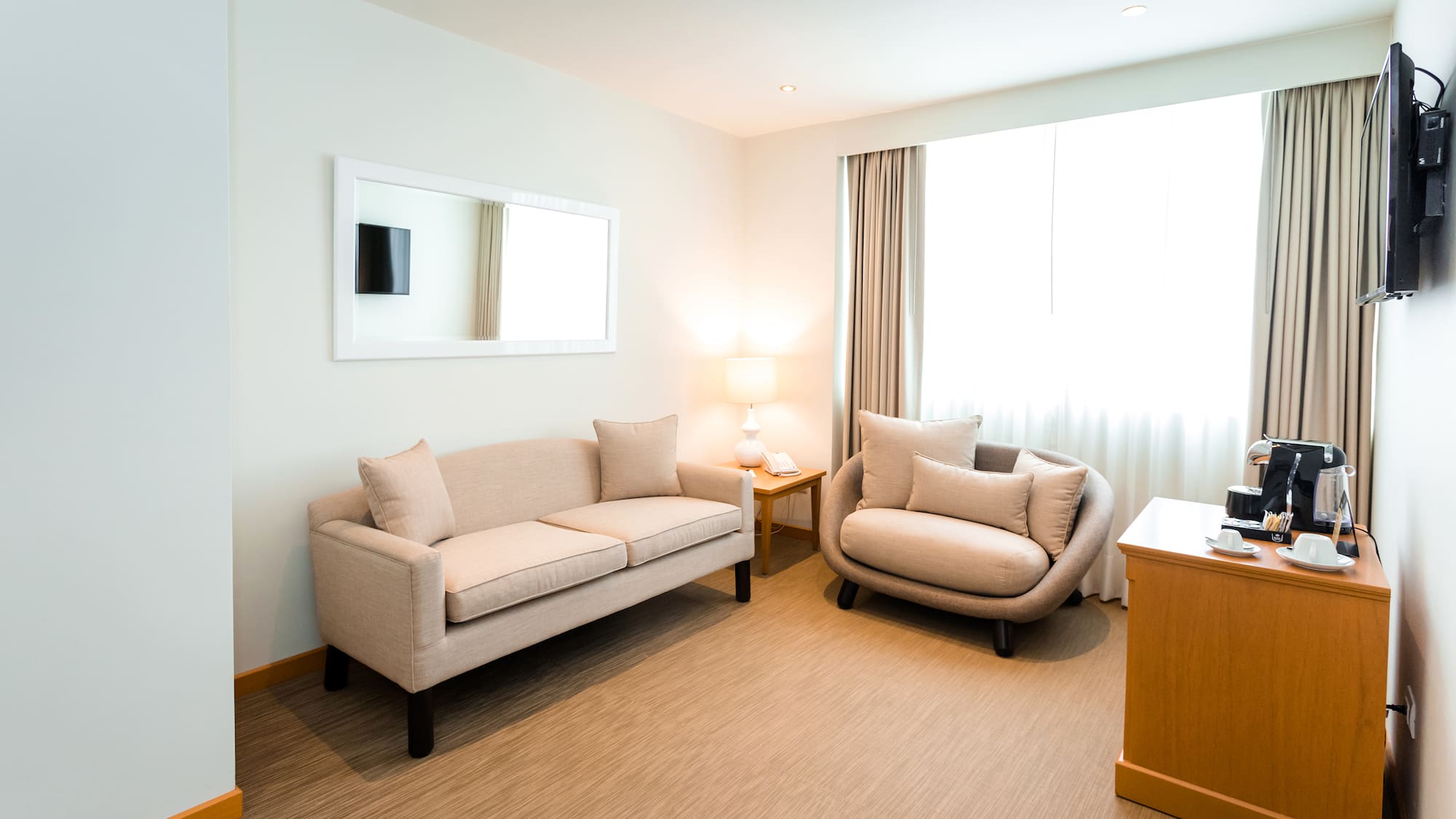 a room with a couch and a chair