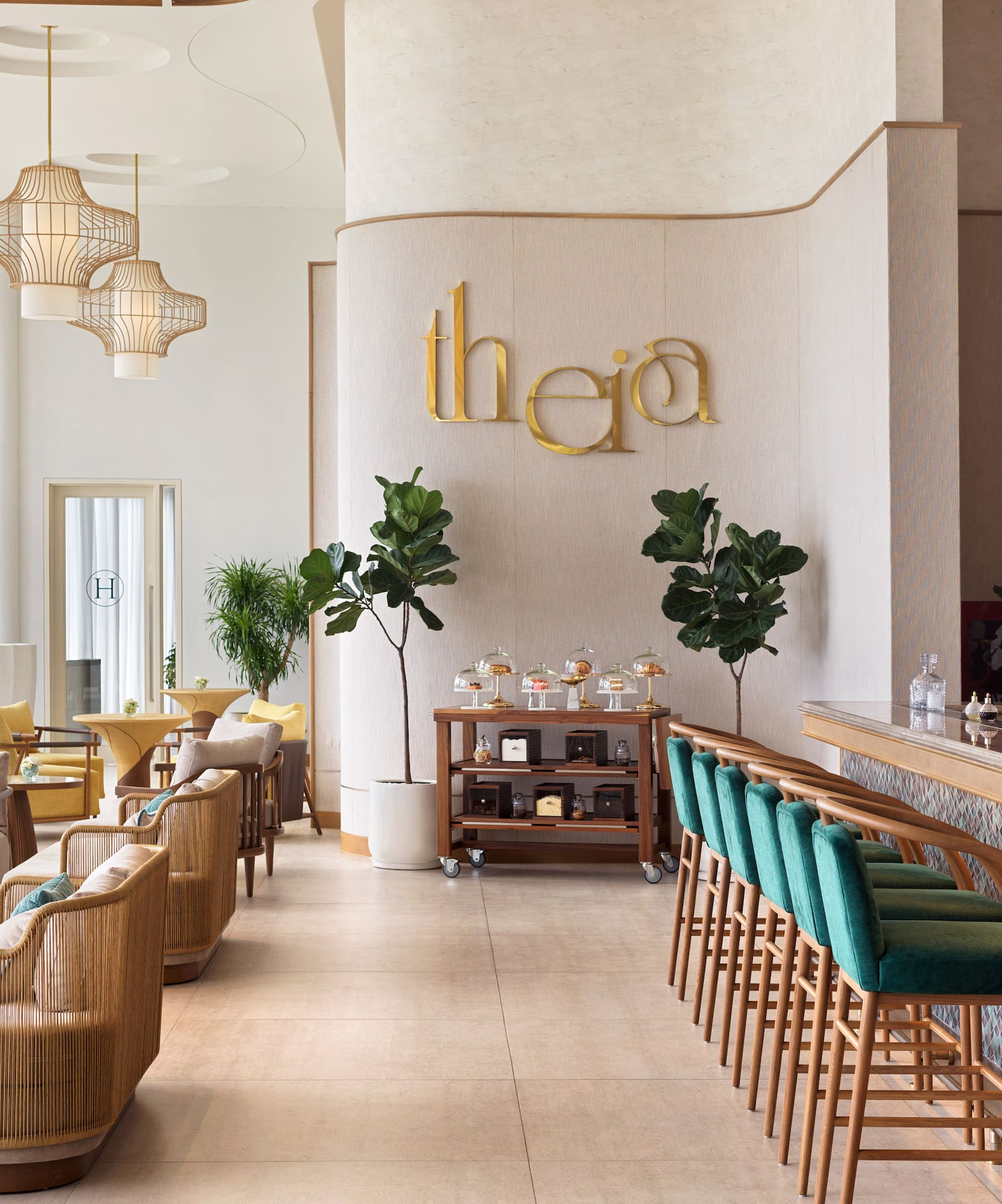 a room with a bar and chairs