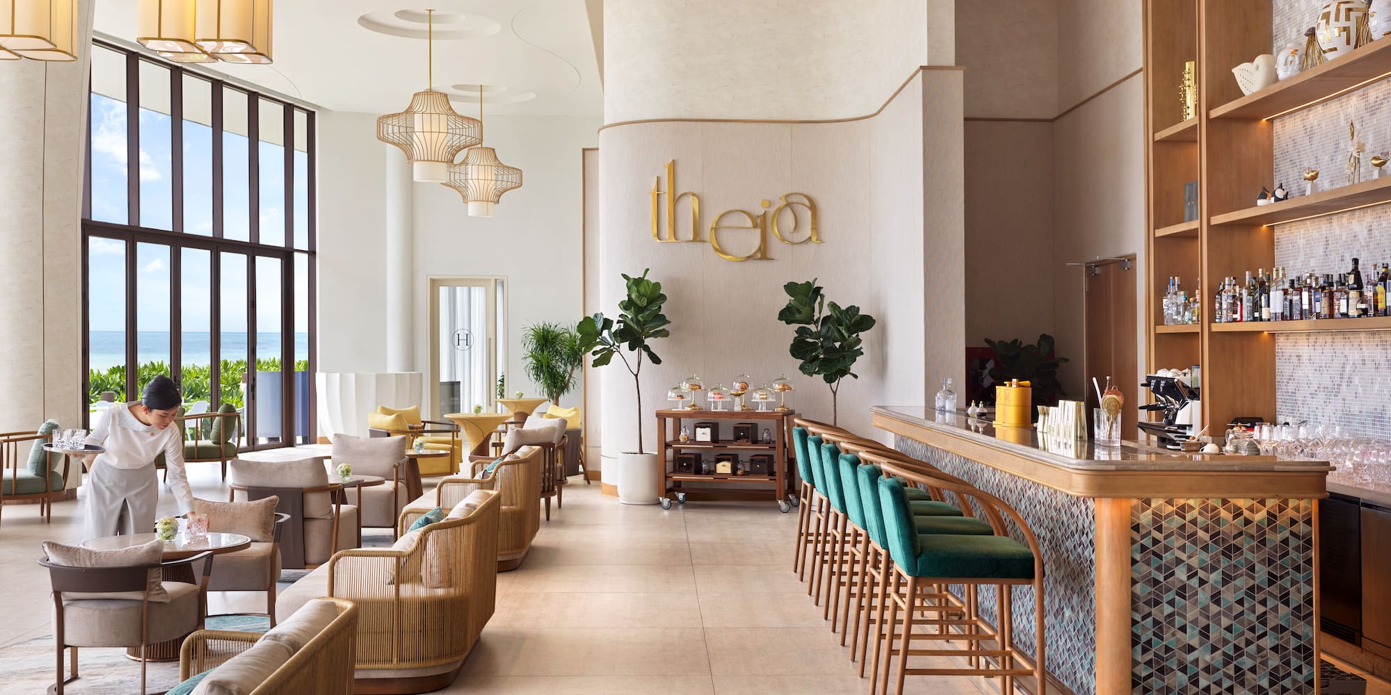 a room with a bar and chairs