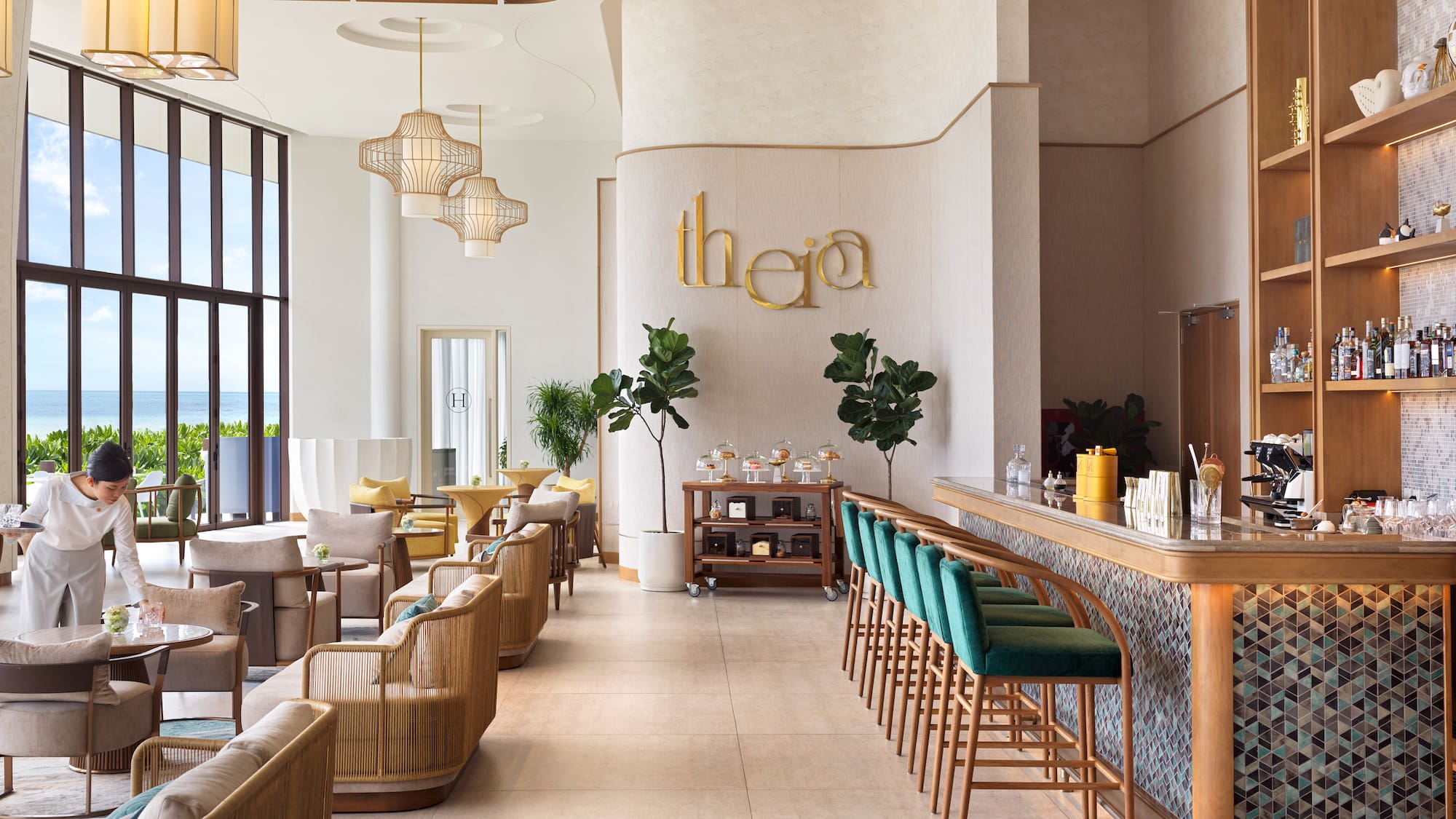 a room with a bar and chairs