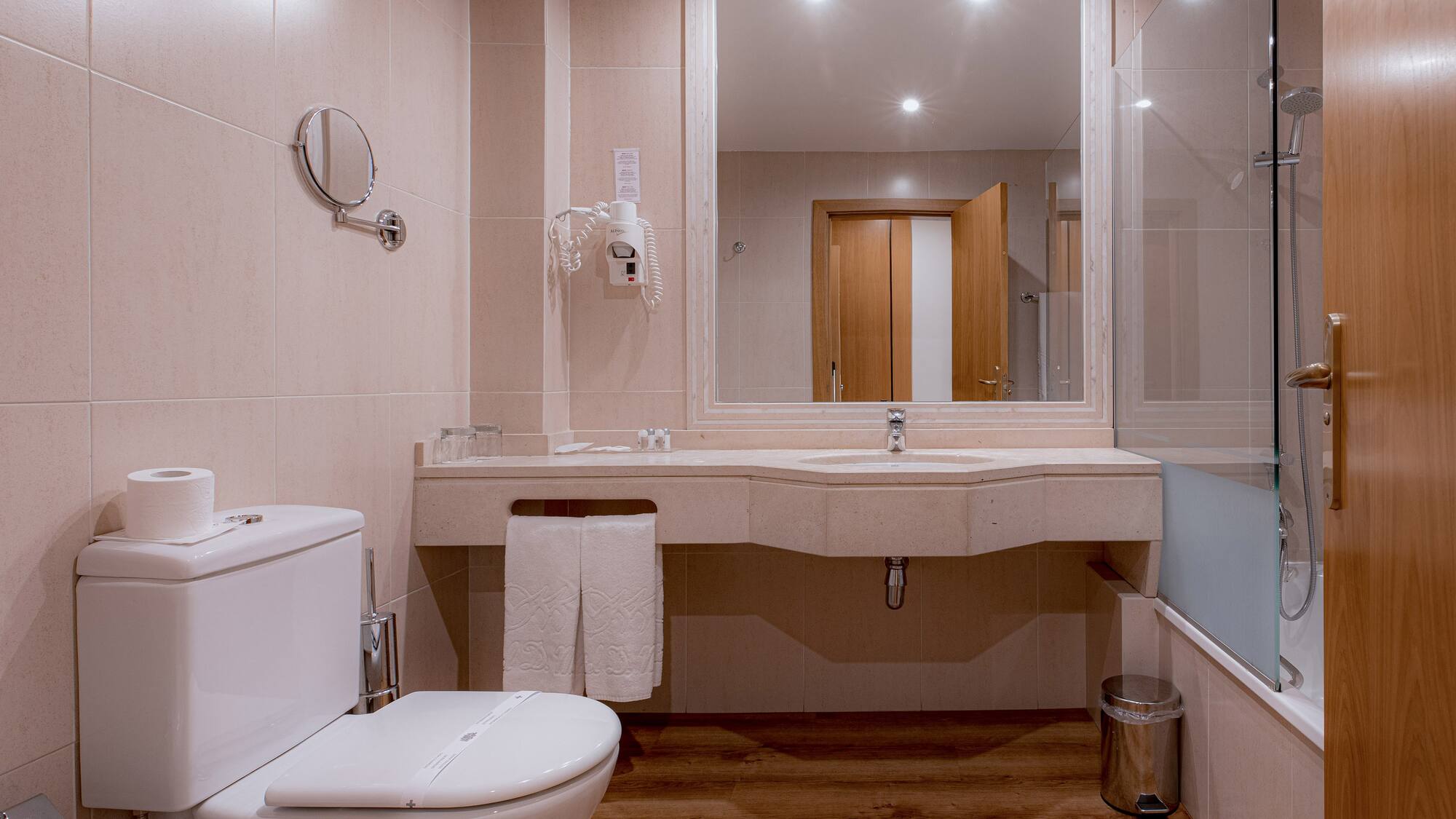 a bathroom with a sink and mirror