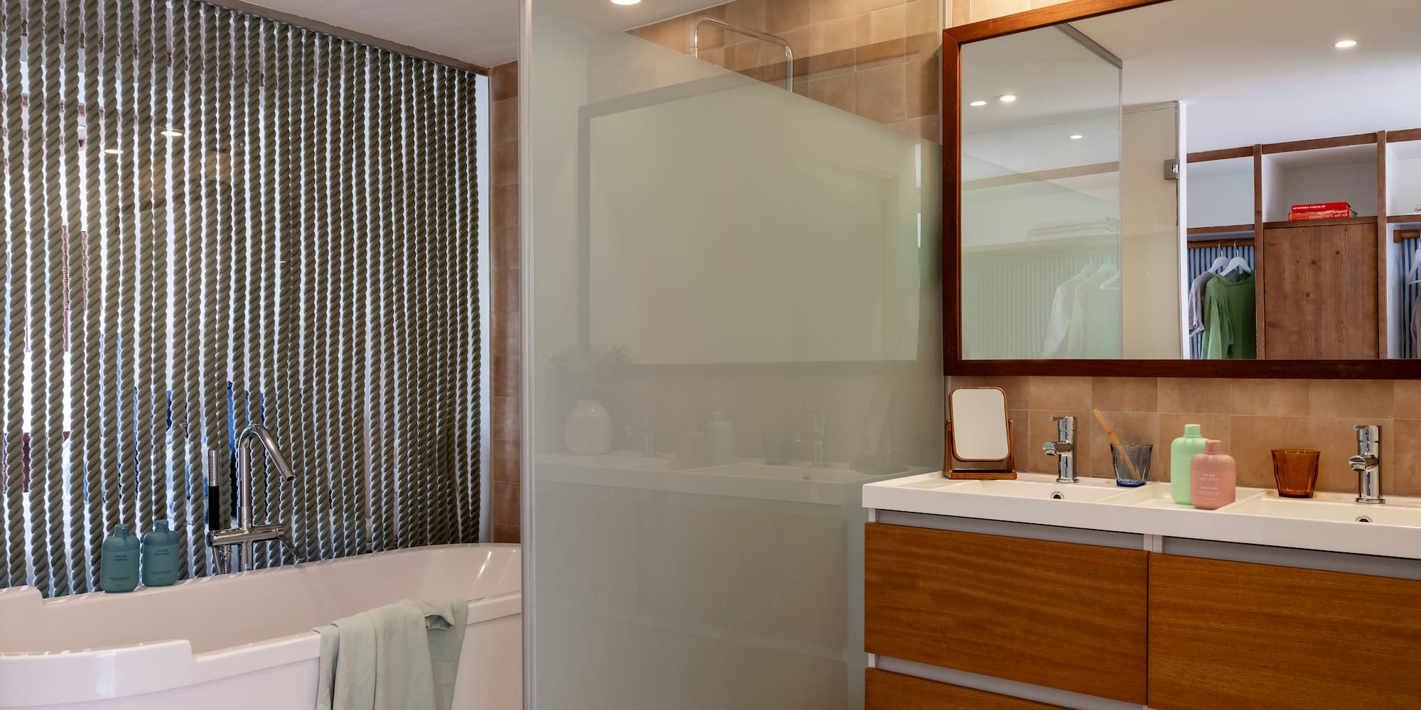 a bathroom with a shower and bathtub