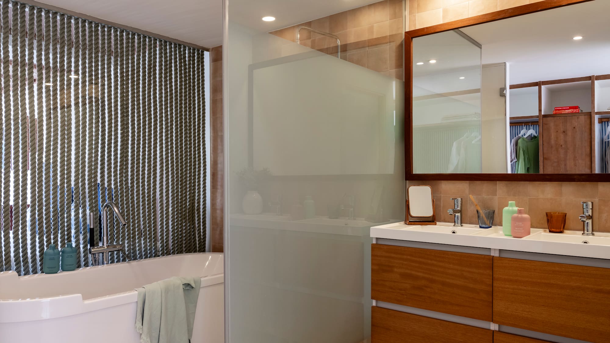 a bathroom with a shower and bathtub