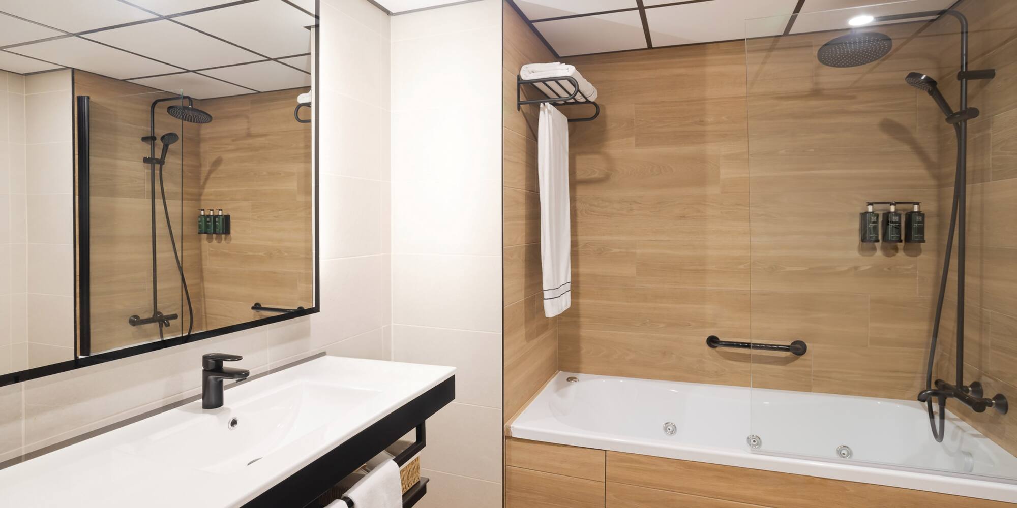 a bathroom with a bathtub and shower