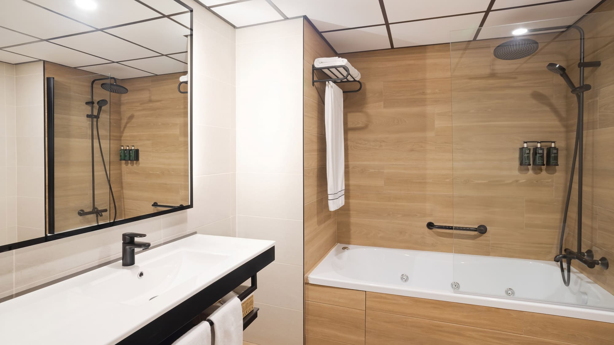 a bathroom with a bathtub and shower