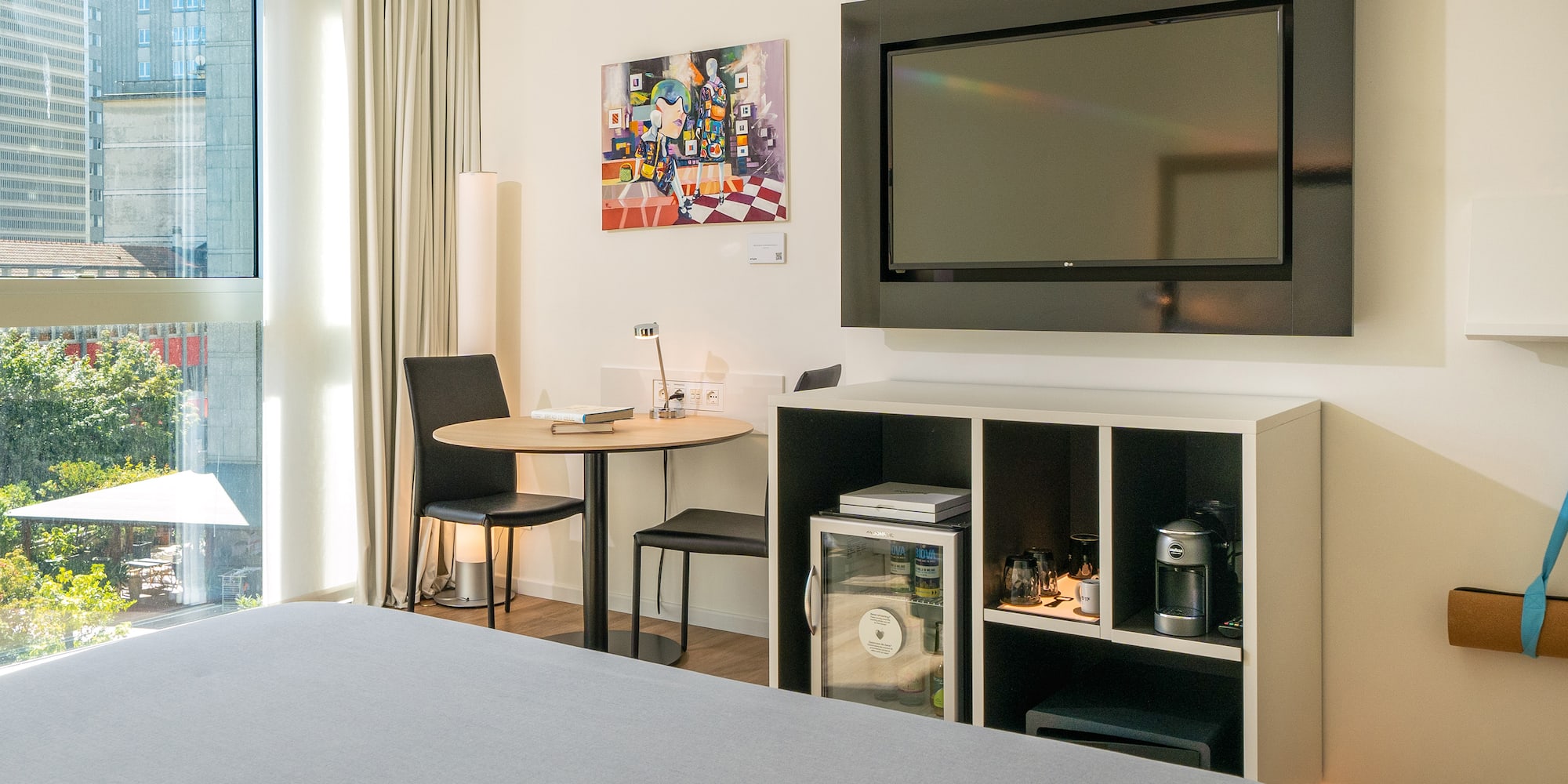 a room with a tv on the wall