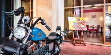 a motorcycle parked outside a building