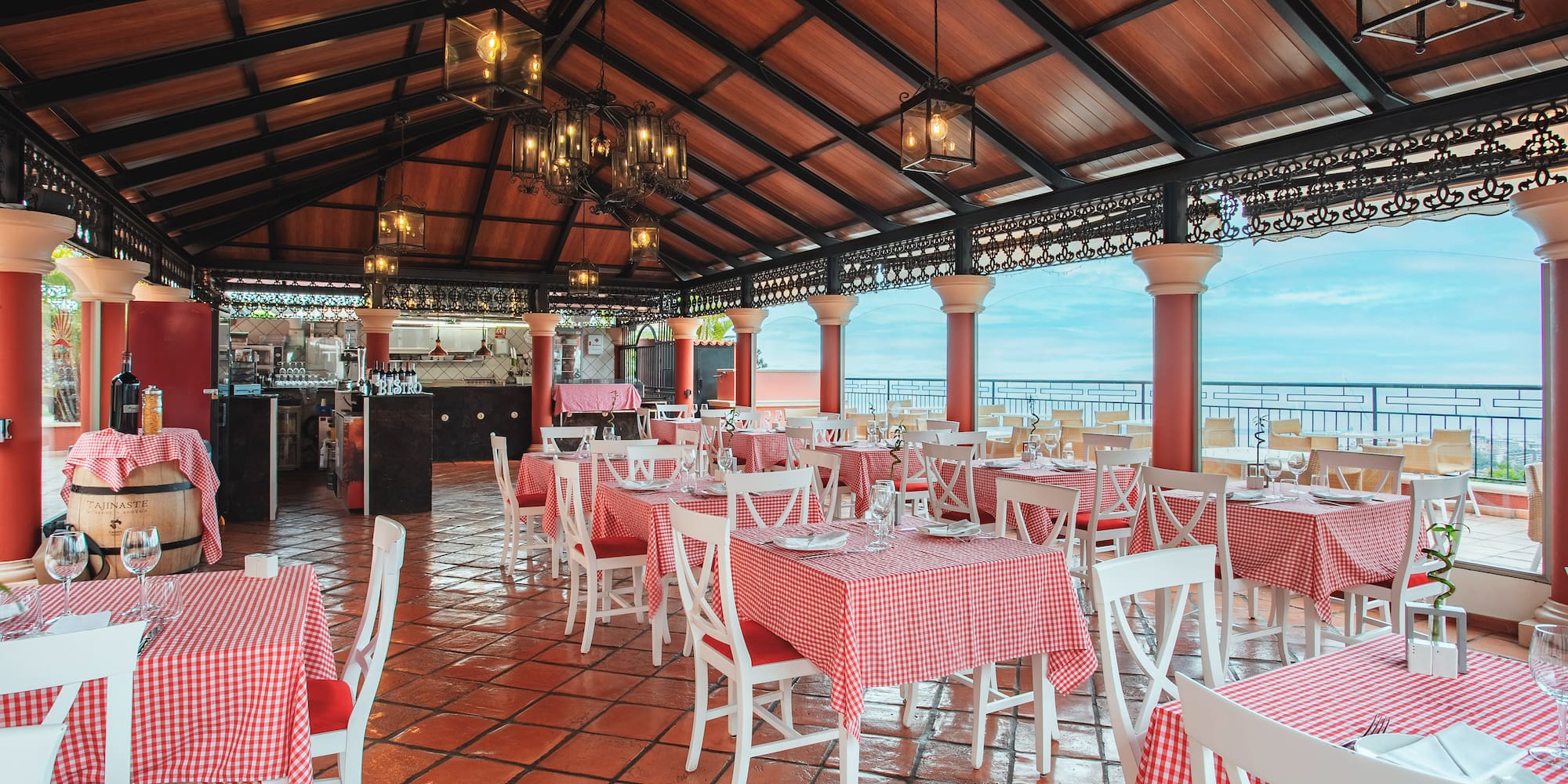 a restaurant with tables and chairs