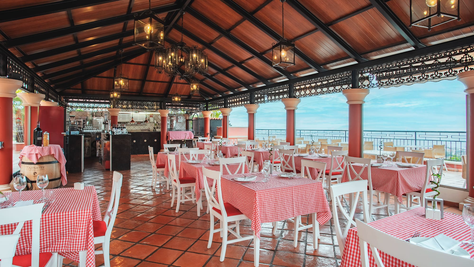 a restaurant with tables and chairs