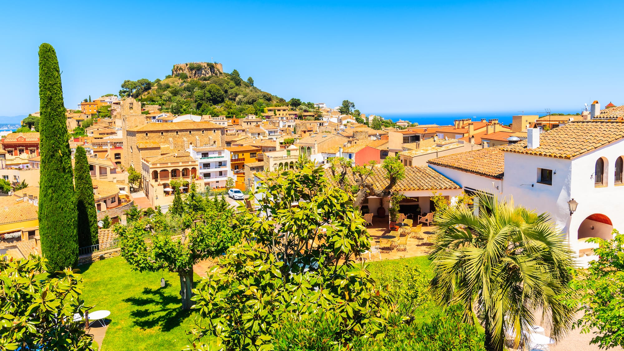 a city with a hill in the background