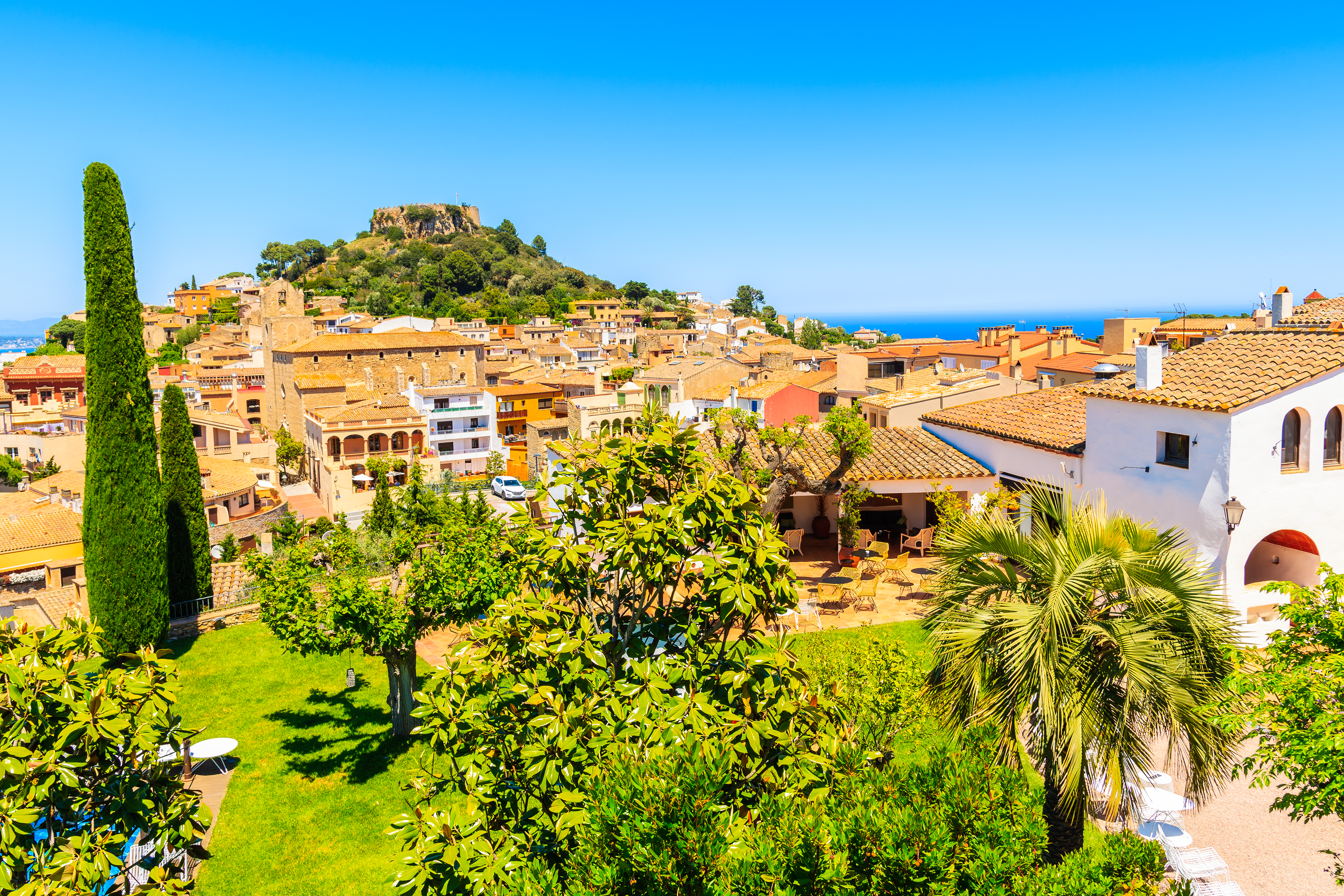 a city with a hill in the background