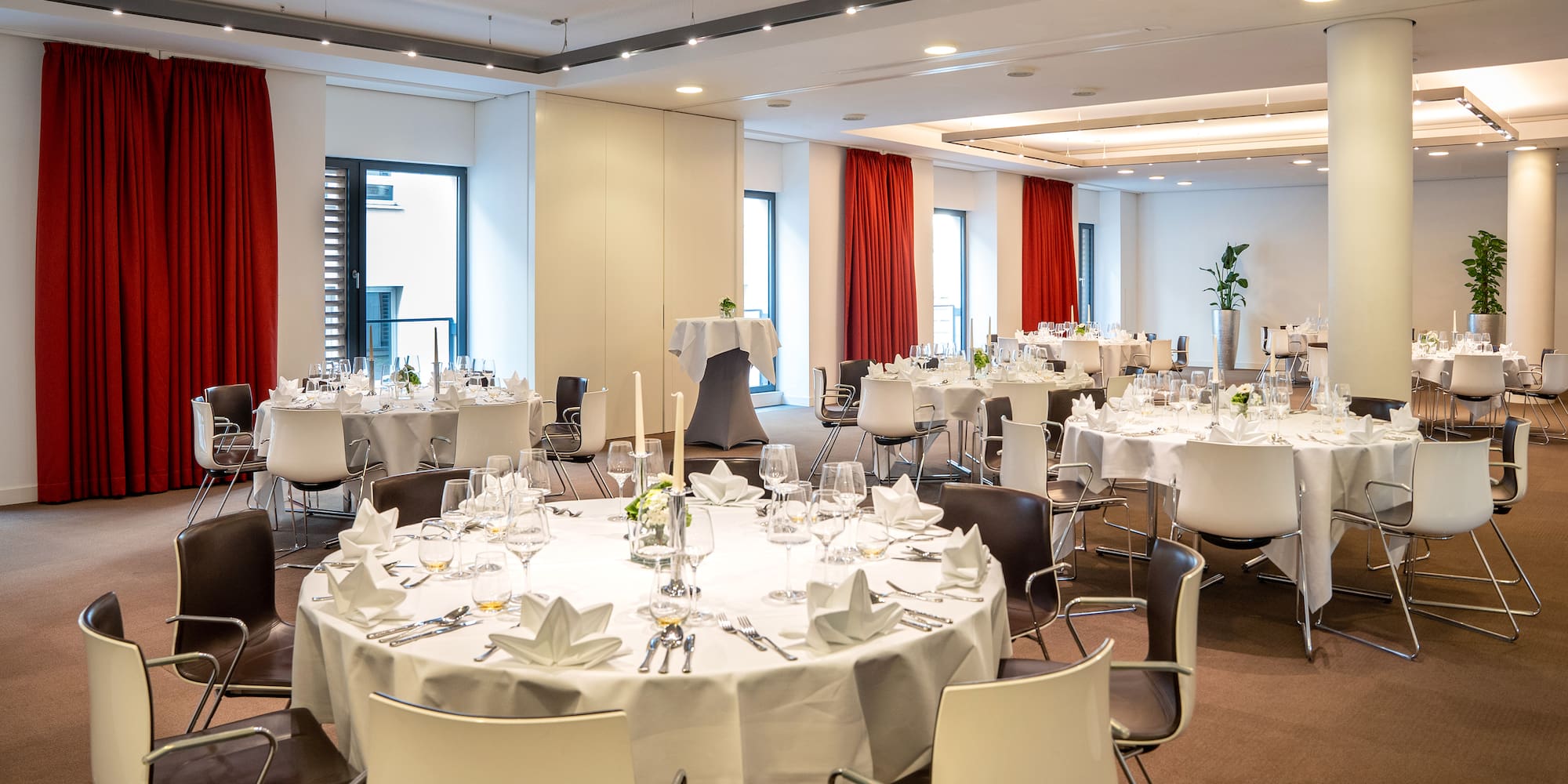 a room with tables and chairs