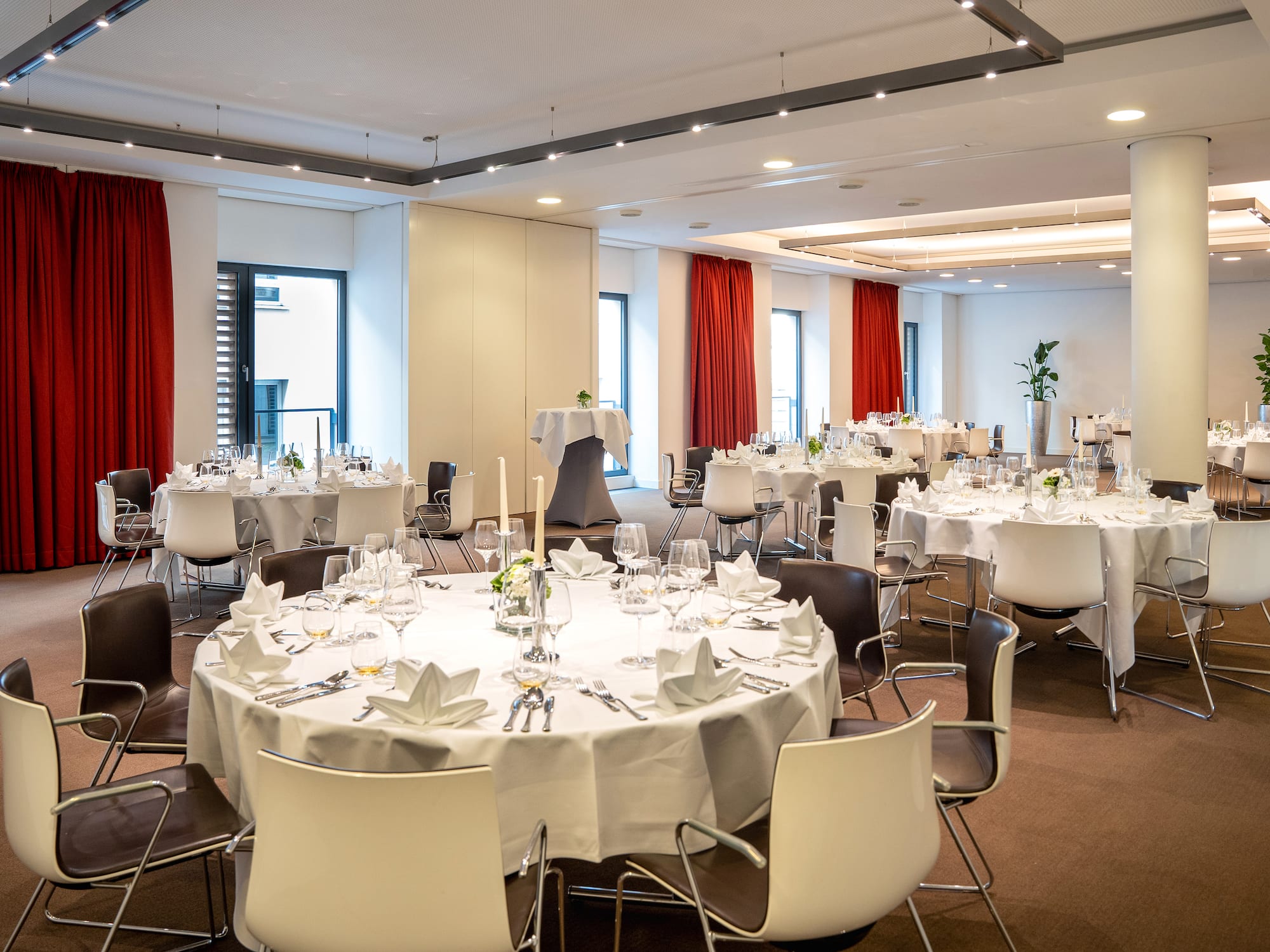 a room with tables and chairs