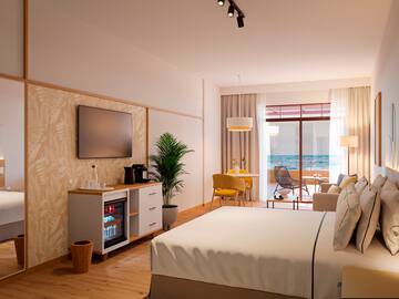a room with a bed and a television