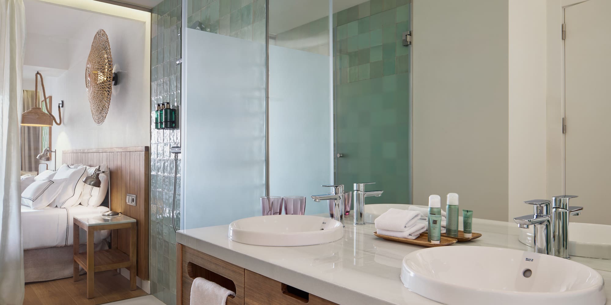 a bathroom with a shower and sink