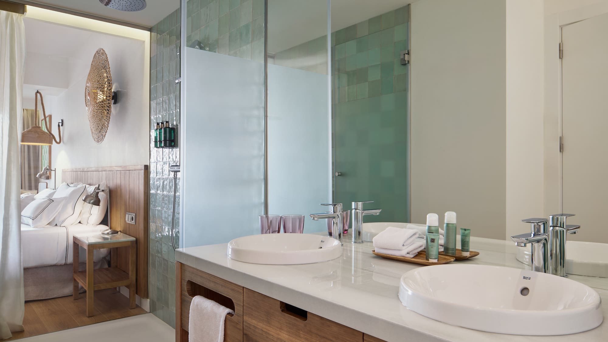 a bathroom with a shower and sink