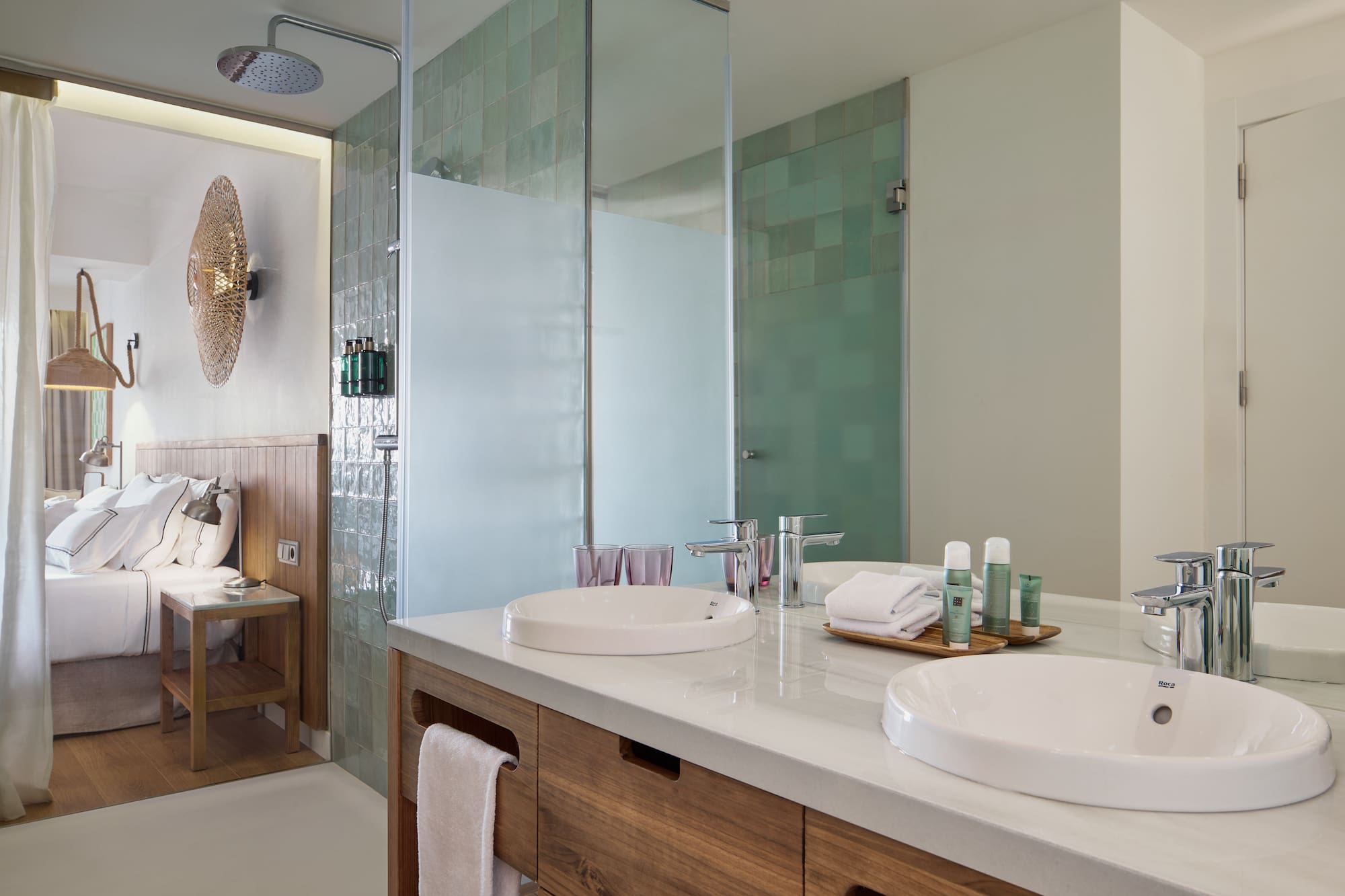 a bathroom with a shower and sink