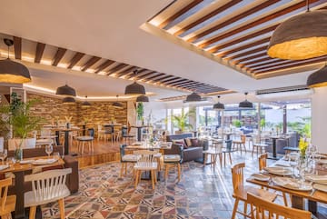 a room with tables and chairs