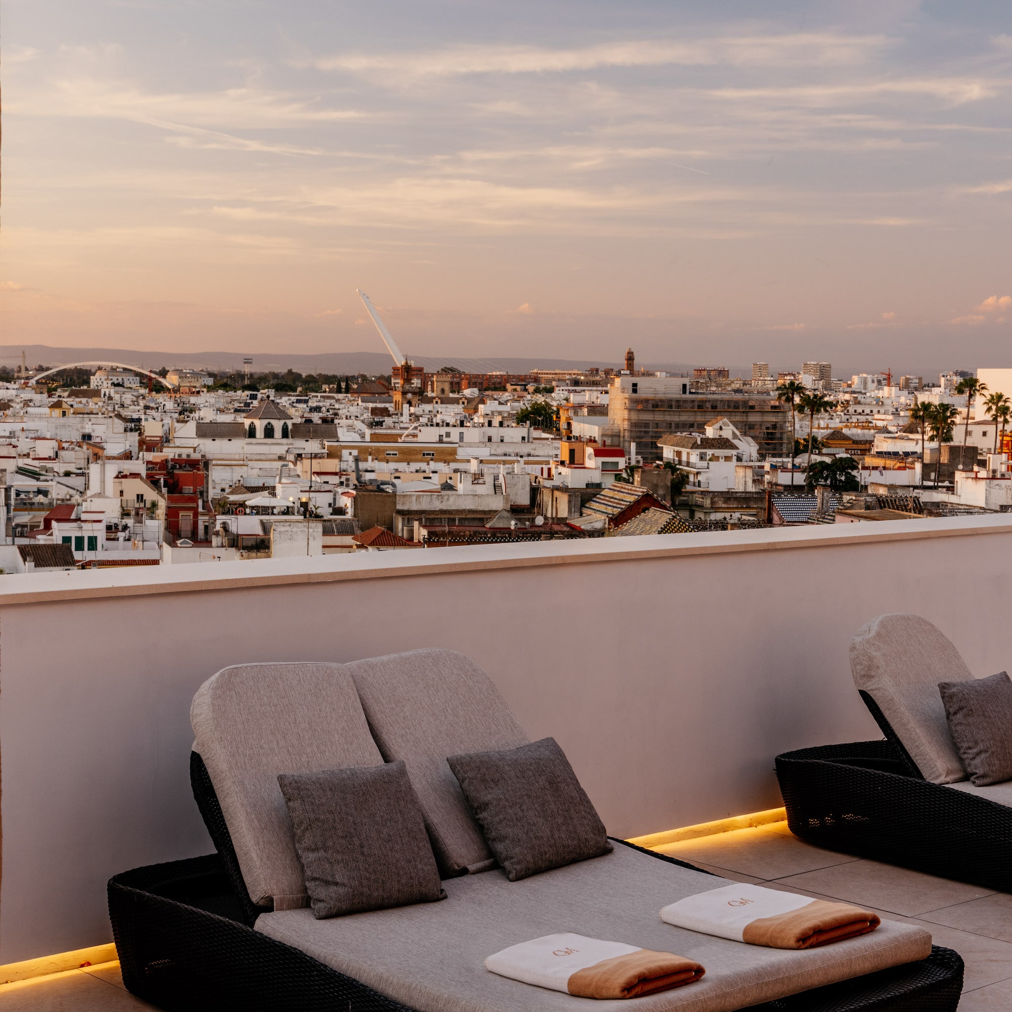 a group of chairs on a rooftop