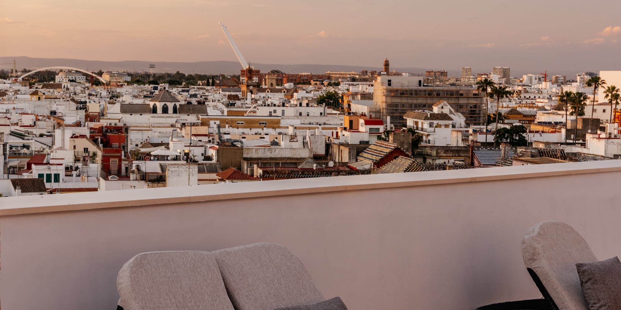 a group of chairs on a rooftop
